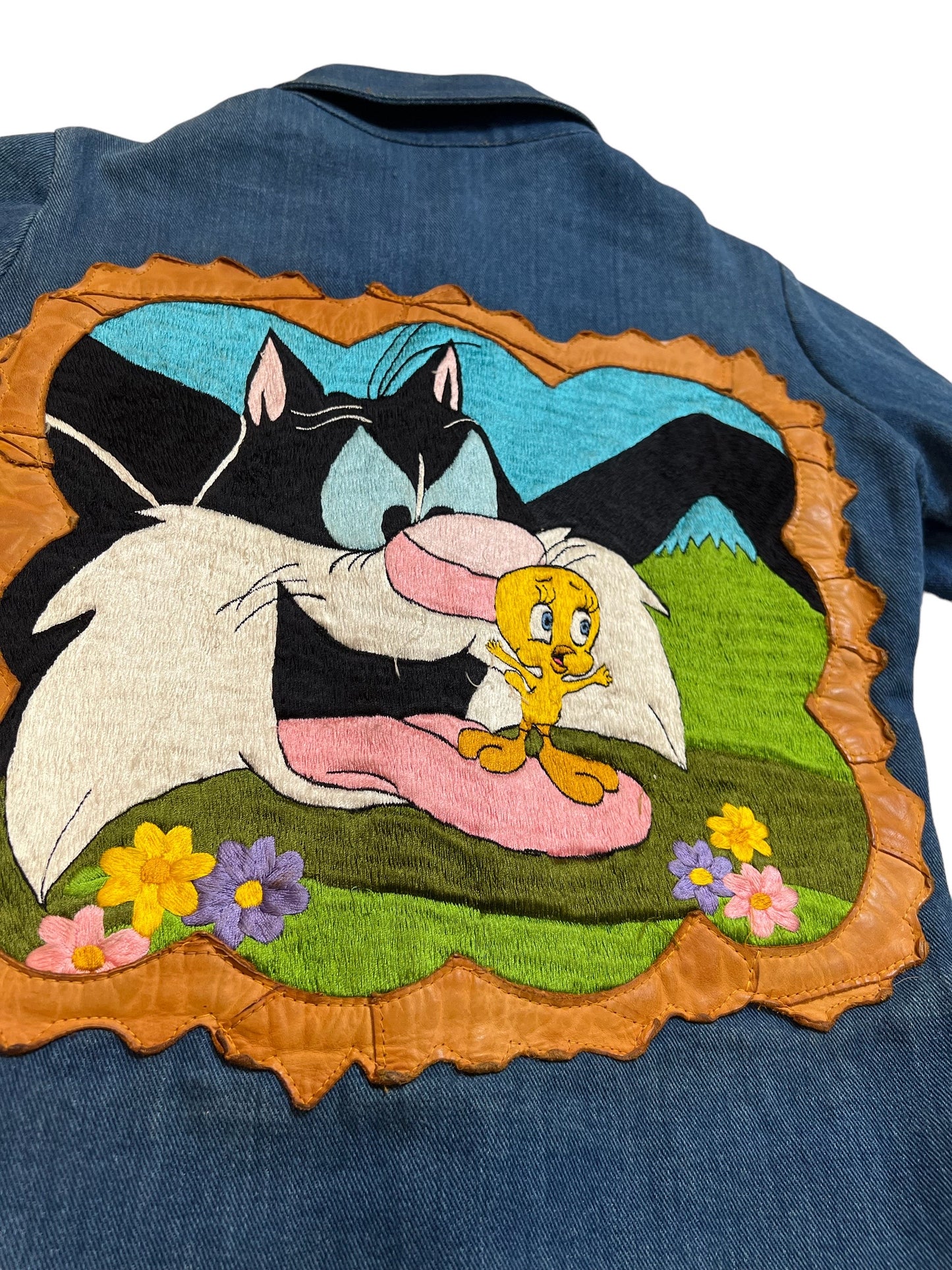 1970s Antonio Guiseppe “Sylvester & Tweety” embroidered denim/leather jacket